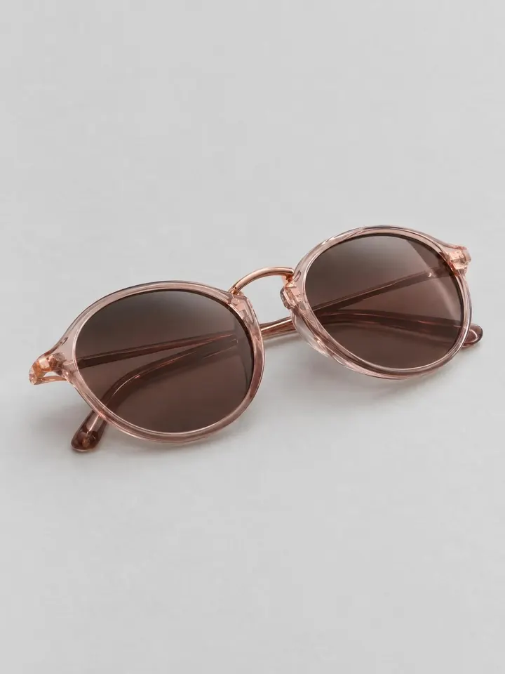 The seller's original photo of rose sunglasses on a grey background